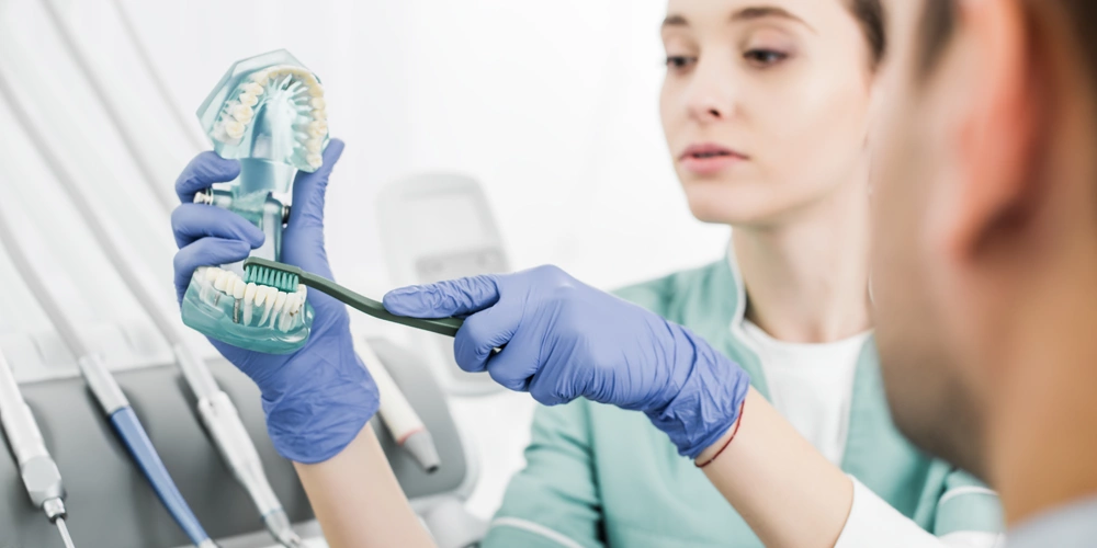 A dental hygenist how to properly care for your teeth after a full mouth debridement