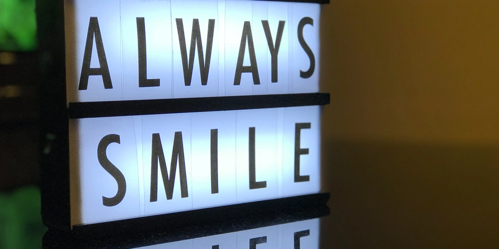 A sign indicating to always smile because we have options for your central sleep apnea